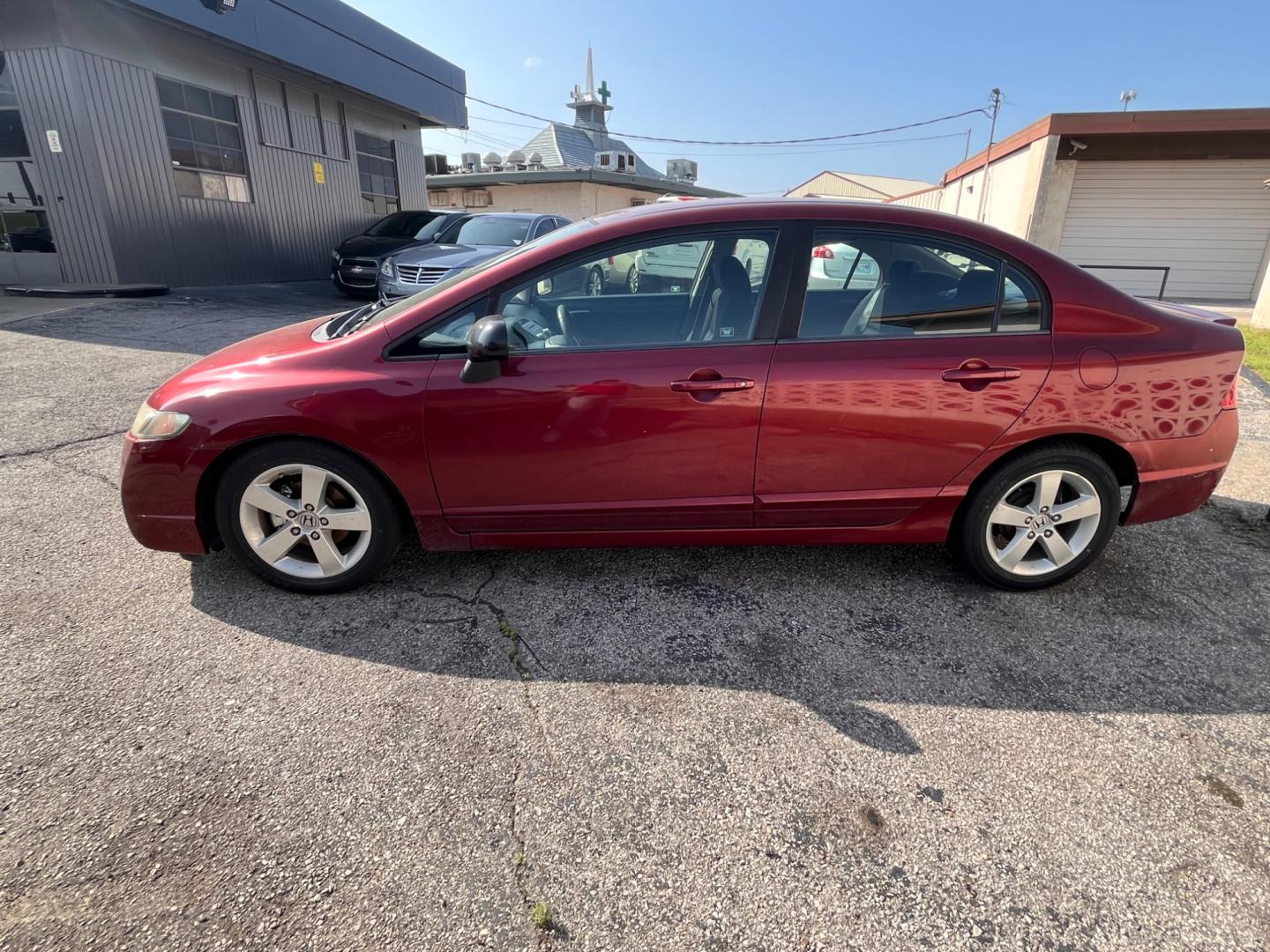 2010 MAROON HONDA CIVIC LX-S LX-S Sedan 5-Speed AT (19XFA1F60AE) with an 1.8L L4 SOHC 16V engine, 5-Speed Automatic transmission, located at 8101 E. Skelly Dr., Tulsa, OK, 74129, (918) 592-3593, 36.121891, -95.888802 - Photo#1